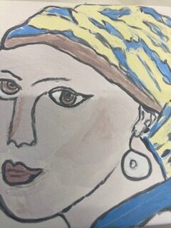 Tegel met vrouwengezicht